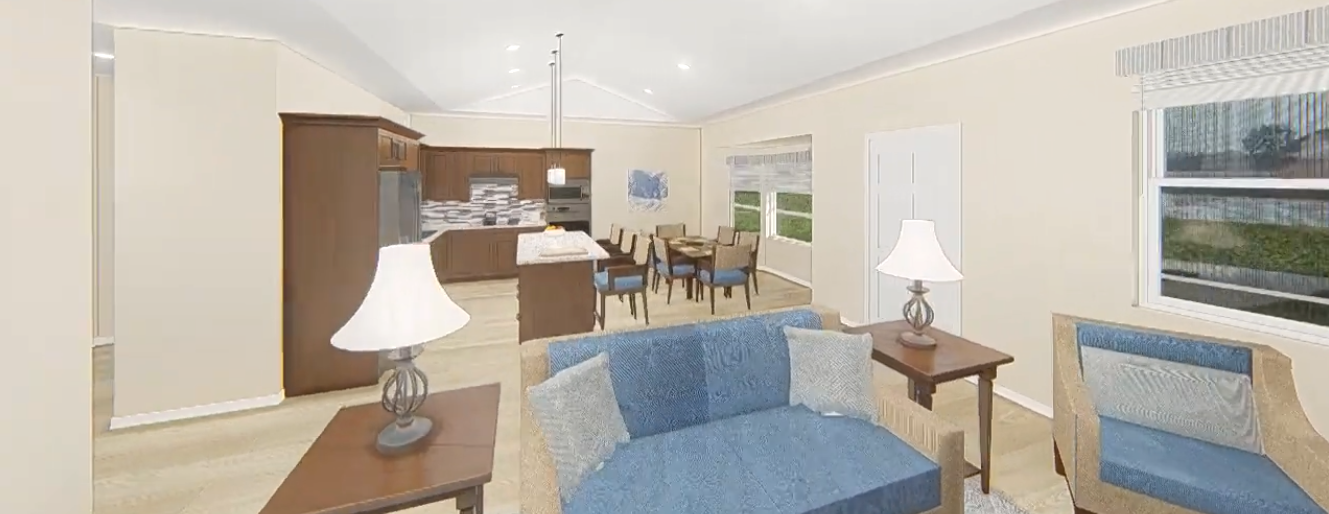 Spacious open-concept living room and kitchen featuring blue seating, lamps, and a dining area.